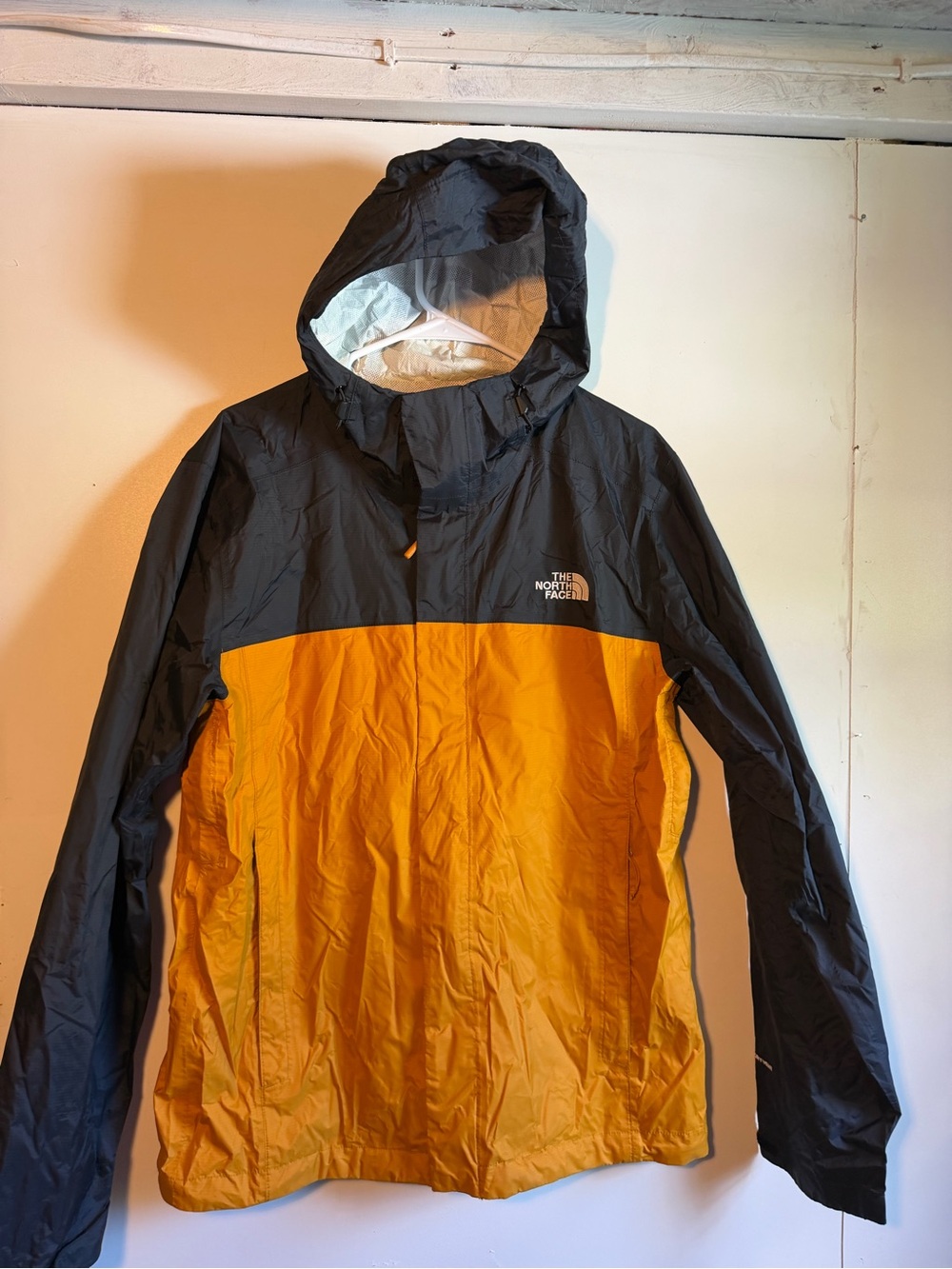 The North Face Black and Orange Hooded Rain Shell
